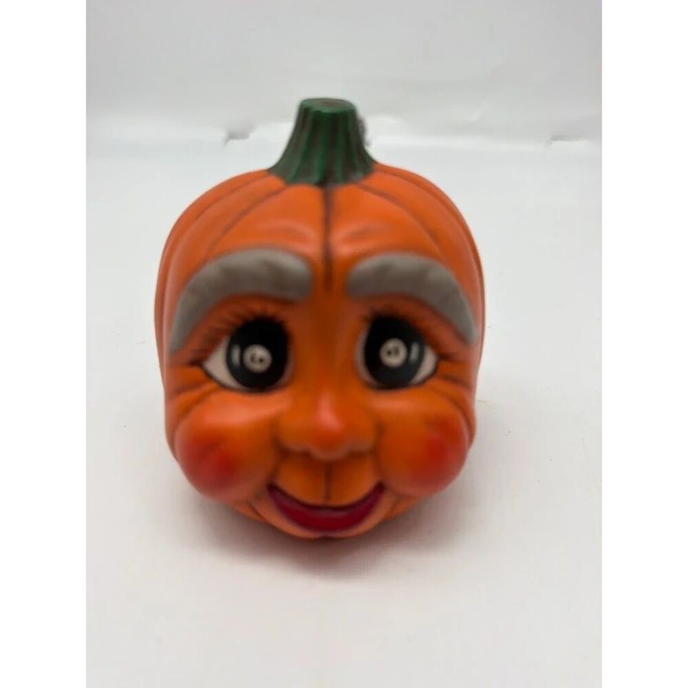 Ceramic painted pumpkin face jack-o’-lantern